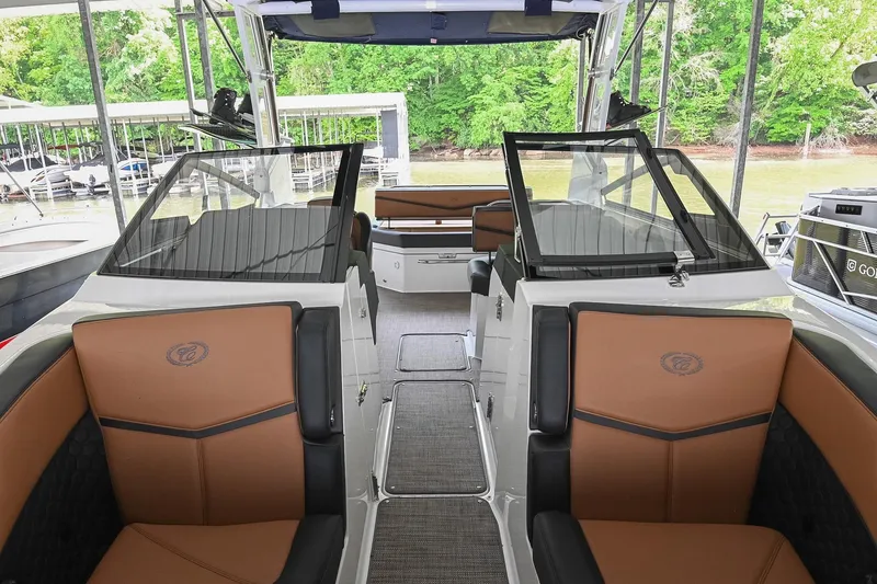 Slide: The Image of 2022 Cobalt R6 Surf boat interior with luxurious seating and modern design. - 6