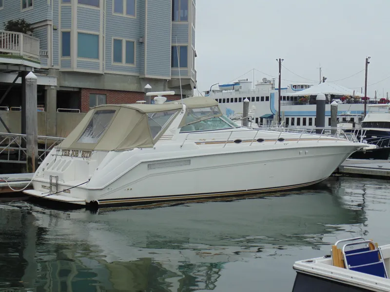 Slide: The Image of 1994 Sea Ray 500 Sundancer yacht docked in harbor. - 37