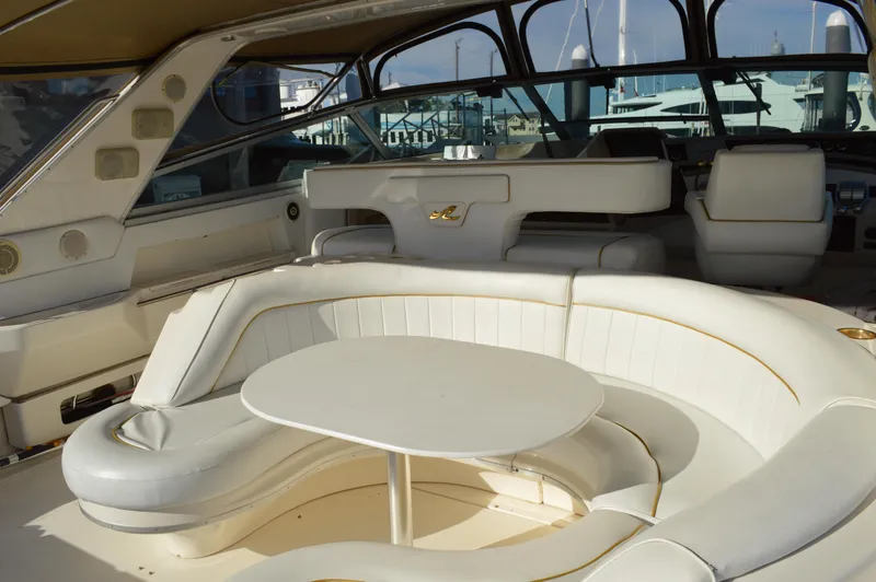 Slide: The Image of Interior of a 1994 Sea Ray 500 Sundancer yacht with luxurious seating area. - 6