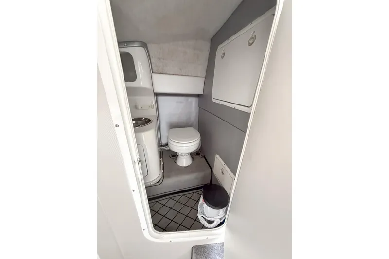 Slide: The Image of 2002 Active Thunder 37 boat bathroom interior with toilet and sink. - 18