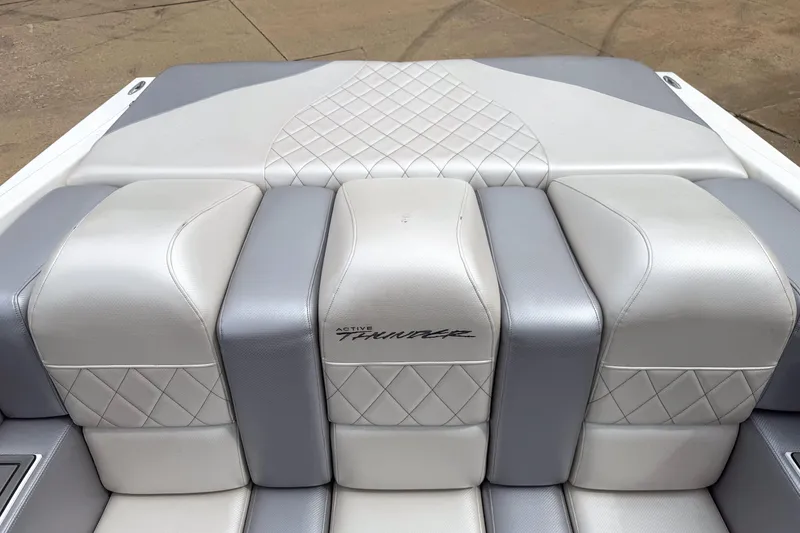 Slide: The Image of 2002 Active Thunder 37 boat interior with quilted leather seats and sleek design. - 21