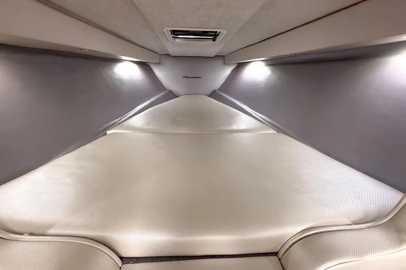 Slide: The Image of Interior cabin of a 2002 Active Thunder 37 boat, featuring sleek, modern design. - 33