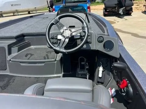 Slide: The Image of Interior of 2025 Ikon Boats VLX 20 with modern helm station. - 7