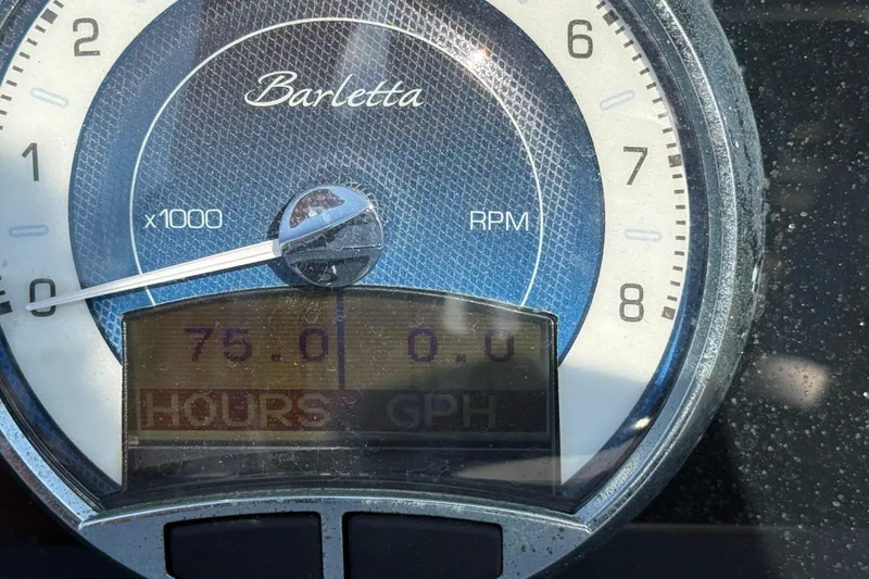Slide: The Image of Close-up of Barletta Corsa 23U 2022 tachometer displaying 75 hours. - 13