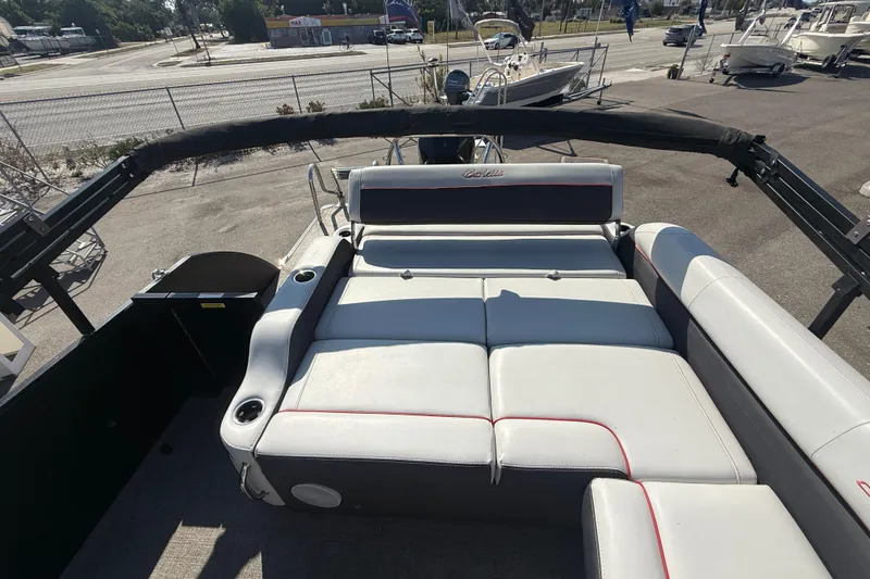 Slide: The Image of 2022 Barletta Corsa 23U pontoon boat with spacious seating and sleek design. - 6