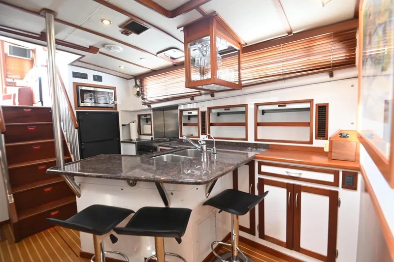 Slide: The Image of Luxurious 2007 Pilot Cruiser Expedition yacht kitchen with modern amenities and sleek design. - 36