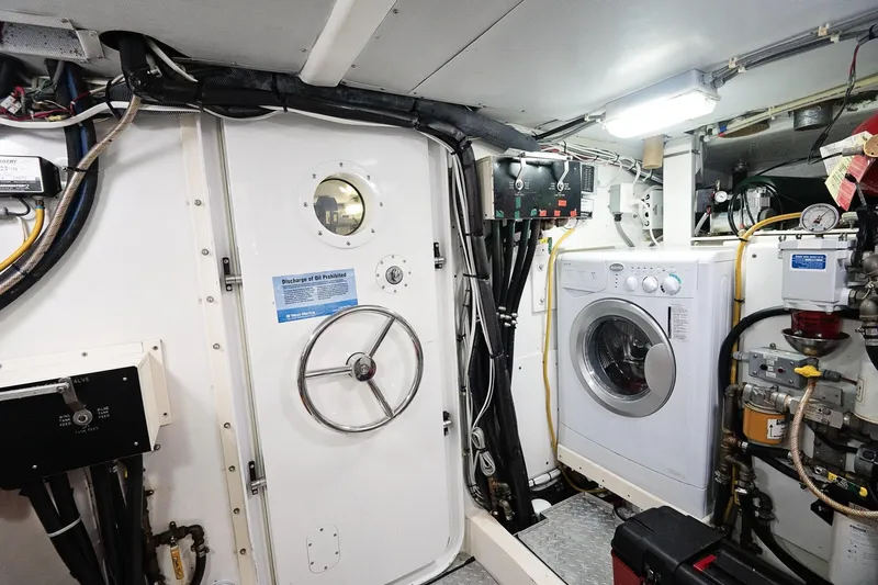Slide: The Image of Engine room of 2007 Pilot Cruiser Expedition with washing machine and control panels. - 59
