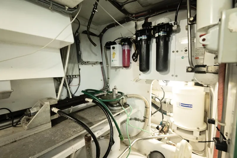 Slide: The Image of Engine room of 2007 Pilot Cruiser Expedition with filtration system and mechanical components. - 66