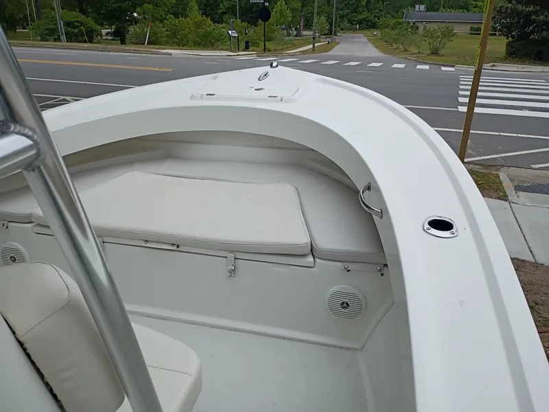 Slide: The Image of 2016 Parker 23SE boat parked near a road. - 21