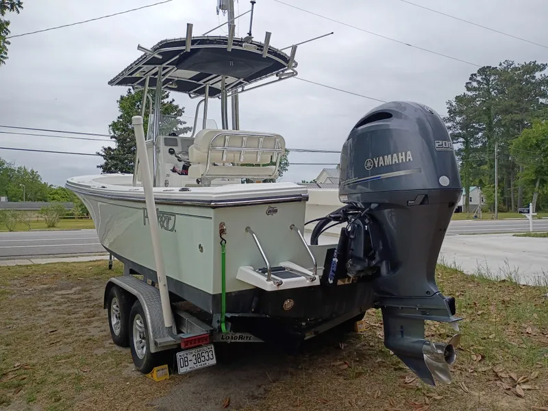 Slide: The Image of 2016 Parker 23SE boat with Yamaha engine on trailer. - 3