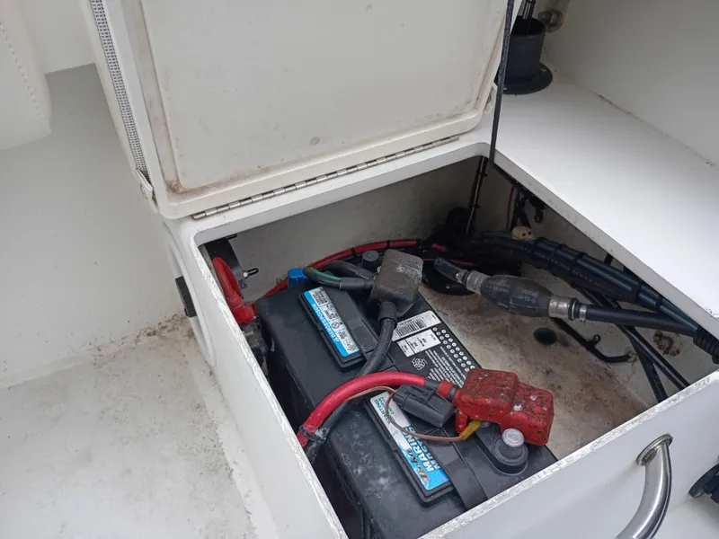 Slide: The Image of Battery compartment of a 2016 Parker 23SE boat. - 33