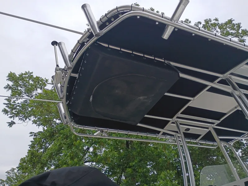 Slide: The Image of Parker 23SE 2016 boat canopy with metal frame and black fabric. - 40