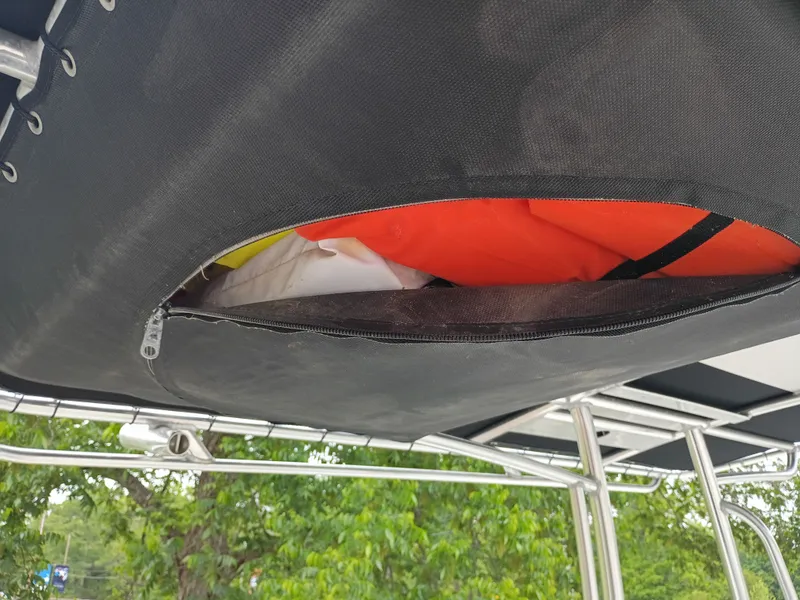 Slide: The Image of Parker 23SE 2016 boat with storage under Bimini top. - 41