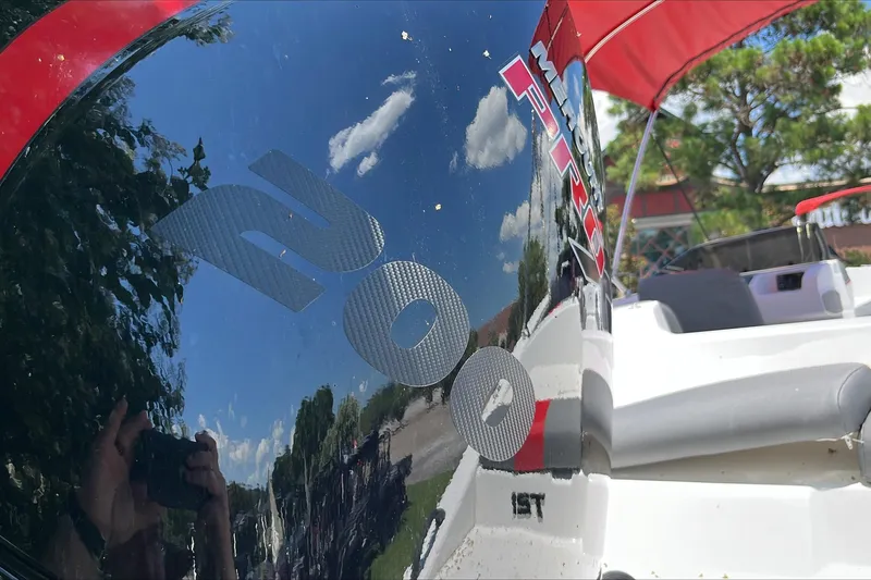 Slide: The Image of Reflection on Tahoe T21 boat with Mercury Pro engine, 2026 model. - 4