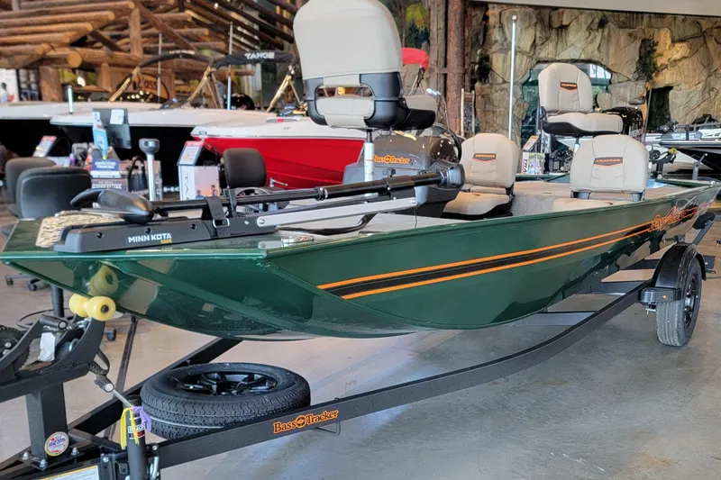 Slide: The Image of 2026 Tracker Bass Tracker Classic Limited boat on display in showroom. - 4