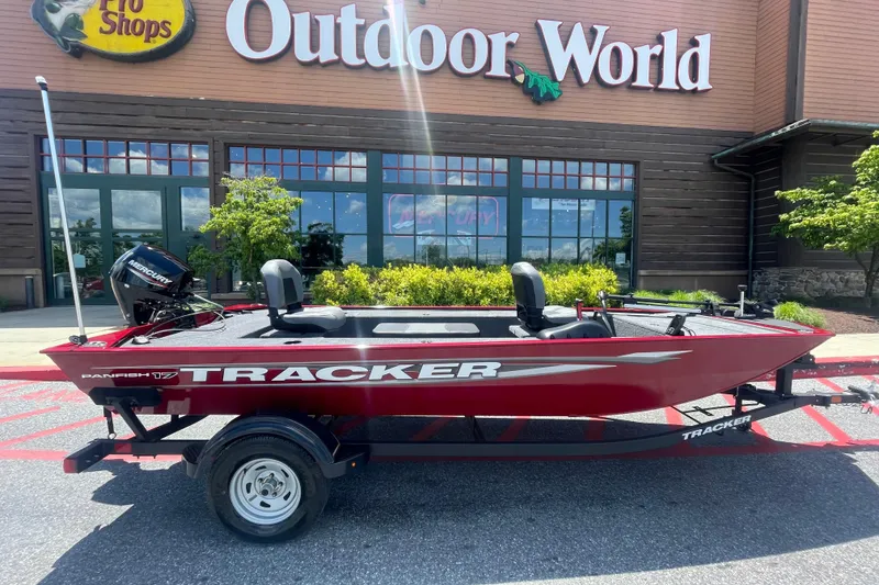 The Image of 2026 Tracker Panfish 17 boat displayed outside Outdoor World store. - 0
