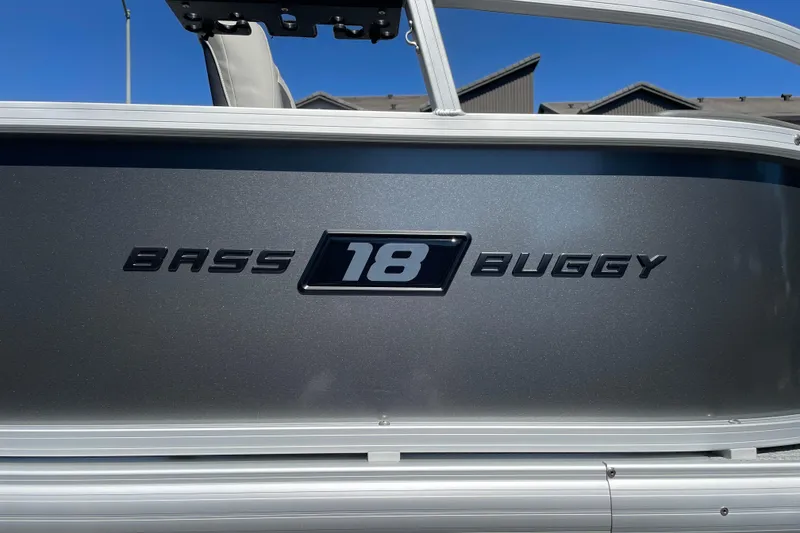 Slide: The Image of 2026 Sun Tracker Bass Buggy 18 DLX pontoon boat, sleek metallic finish. - 37