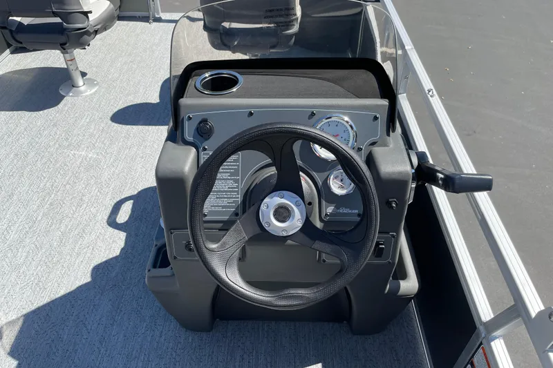 Slide: The Image of Steering console of 2026 Sun Tracker Bass Buggy 18 DLX pontoon boat. - 23