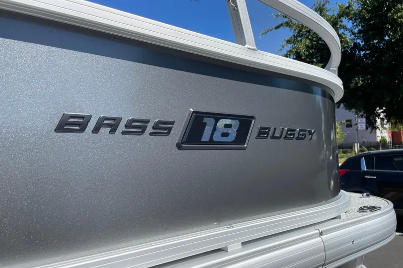 Slide: The Image of 2026 Sun Tracker Bass Buggy 18 DLX pontoon boat, silver exterior detail. - 38