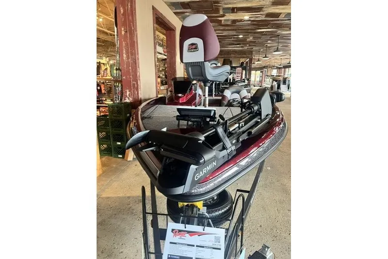Slide: The Image of 2026 Ranger Z185 boat with Garmin equipment displayed indoors. - 1