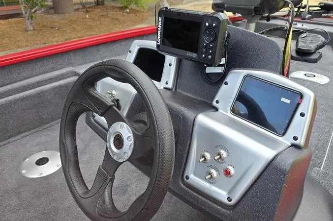 Slide: The Image of Steering console of 2026 Tracker Pro Team 175 Crappie Edition boat with navigation equipment. - 8