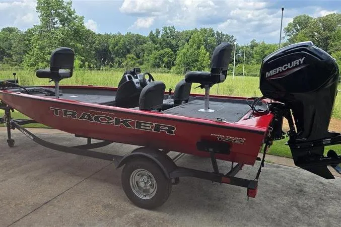 Slide: The Image of 2026 Tracker Pro Team 175 Crappie Edition boat with Mercury engine on trailer. - 4
