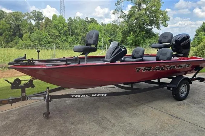 Slide: The Image of 2026 Tracker Pro Team 175 Crappie Edition boat on trailer, parked outdoors. - 3