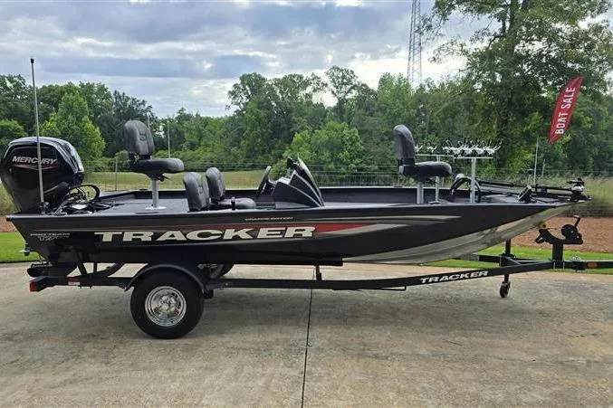 Slide: The Image of 2026 Tracker Pro Team 175 Crappie Edition boat on trailer, featuring Mercury engine. - 2