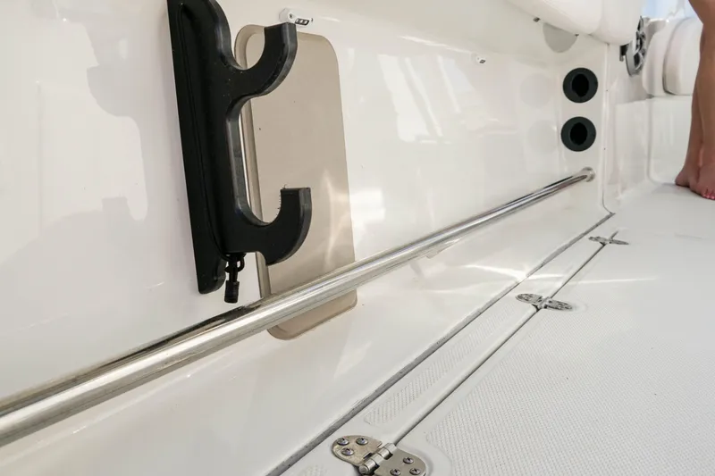 Slide: The Image of Interior view of 2024 Finseeker 230 CC boat, featuring sleek design and stainless steel rail. - 16