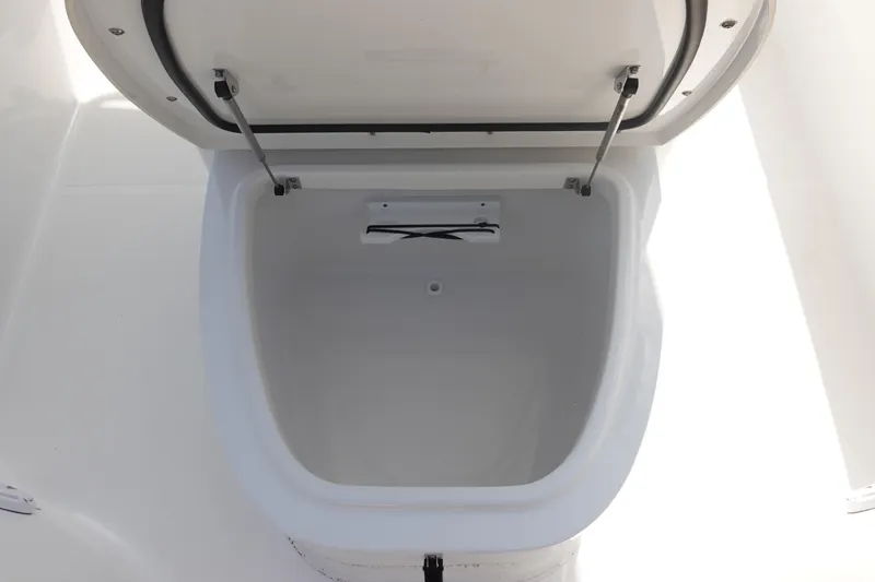 Slide: The Image of Open storage compartment on 2023 Sea Hunt Escape 28 boat. - 23