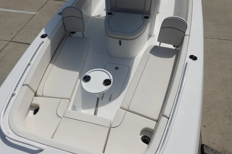 Slide: The Image of 2023 Sea Hunt Escape 28 boat interior with seating and table. - 26