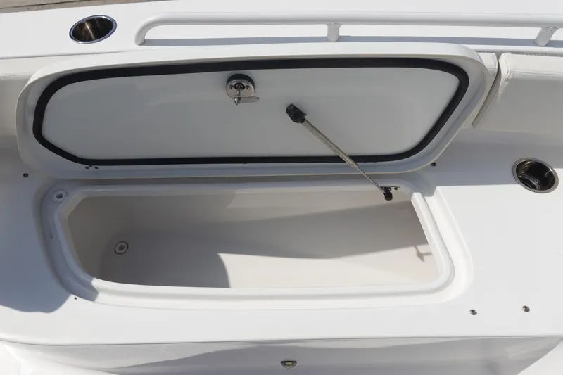 Slide: The Image of Open storage compartment on 2023 Sea Hunt Escape 28 boat. - 30