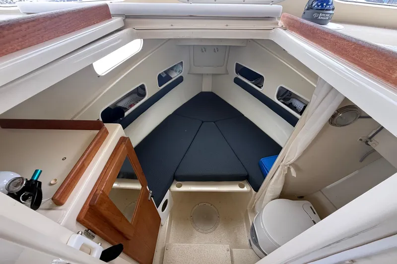 Slide: The Image of 2008 Rosborough RF-246 Sedan Cruiser cabin interior with cozy seating and compact amenities. - 14