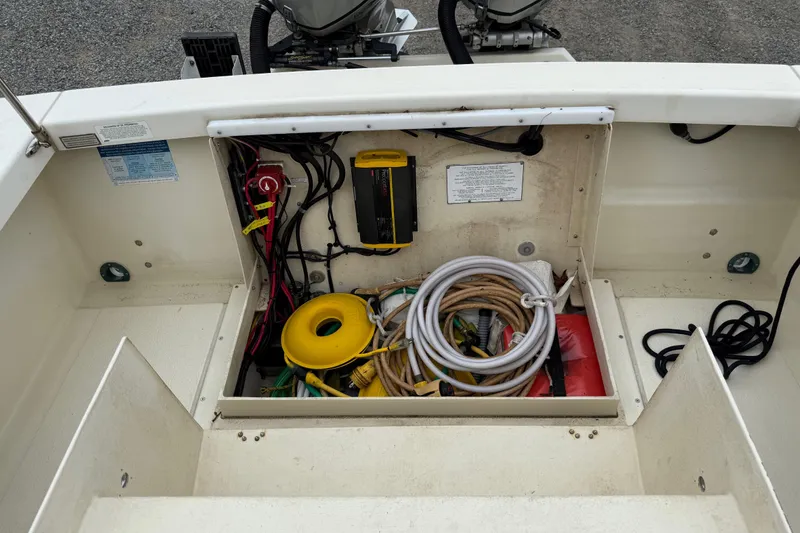 Slide: The Image of Storage compartment of 2008 Rosborough RF-246 Sedan Cruiser with cables and equipment. - 21