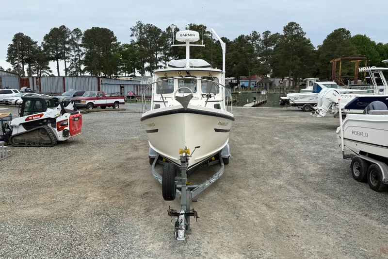 Slide: The Image of 2008 Rosborough RF-246 Sedan Cruiser on trailer in marina lot. - 23