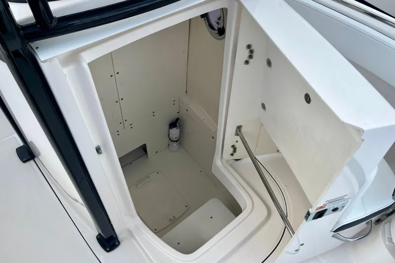 Slide: The Image of Interior of the 2025 Robalo R230 Center Console boat. - 29