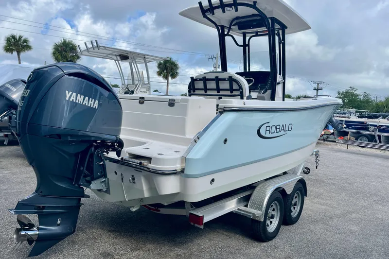 Slide: The Image of 2025 Robalo R230 Center Console with Yamaha engine on trailer. - 6