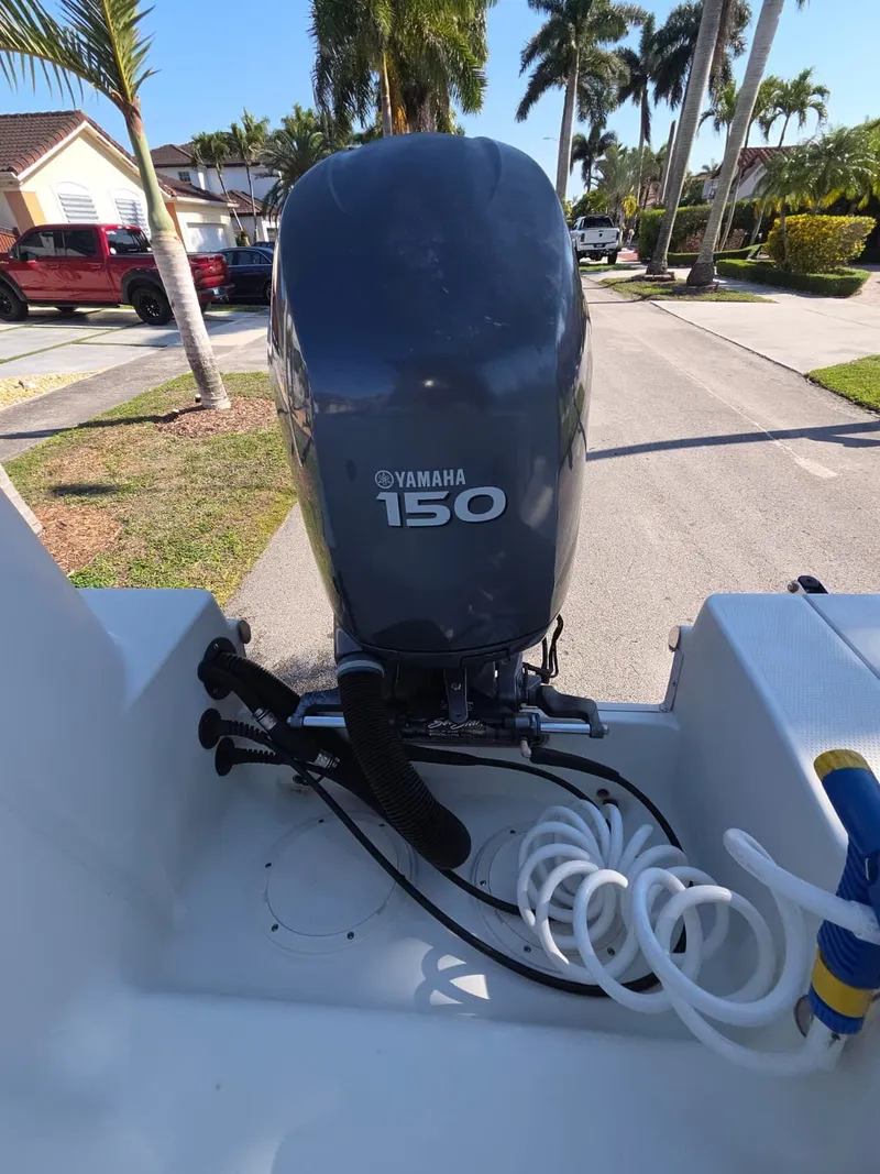 Slide: The Image of Yamaha 150 outboard motor on a 2007 Sailfish 218 CC boat. - 17