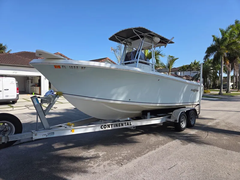 Slide: The Image of 2007 Sailfish 218 CC boat on trailer, sunny day. - 18