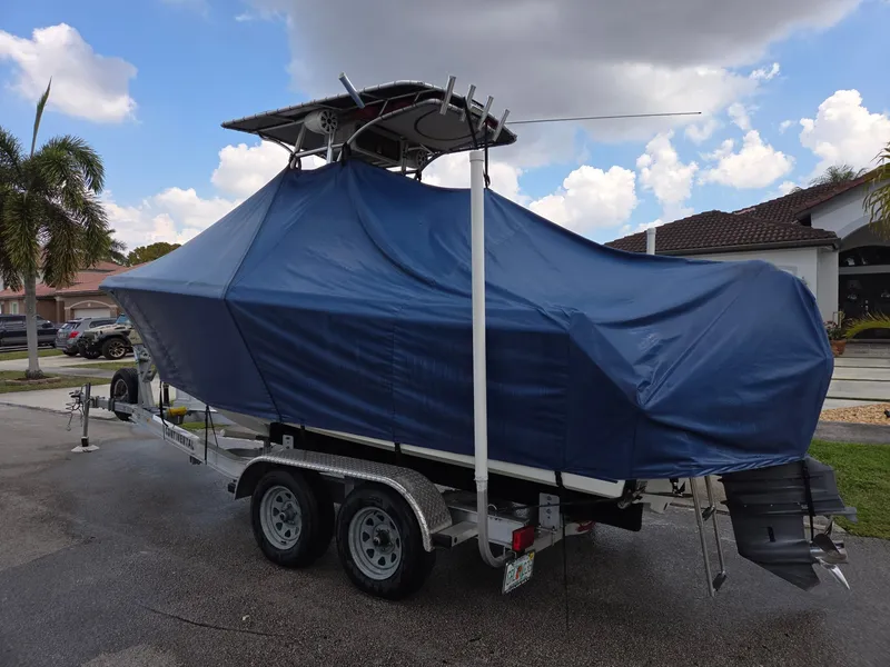 Slide: The Image of Covered 2007 Sailfish 218 CC boat on trailer. - 3
