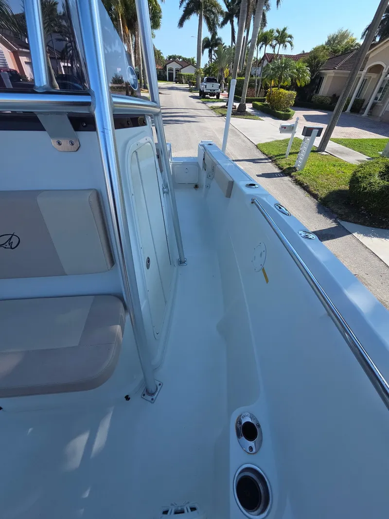 Slide: The Image of Interior view of a 2007 Sailfish 218 CC boat on a street. - 5
