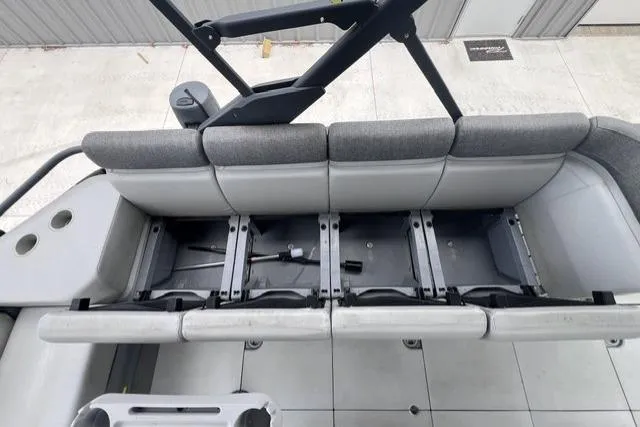 Slide: The Image of 2022 Seadoo Switch boat interior with foldable seating and storage compartments. - 13