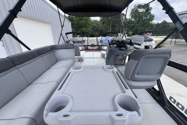 Slide: The Image of 2022 Seadoo Switch interior with seating and control console, showcasing modern design. - 7