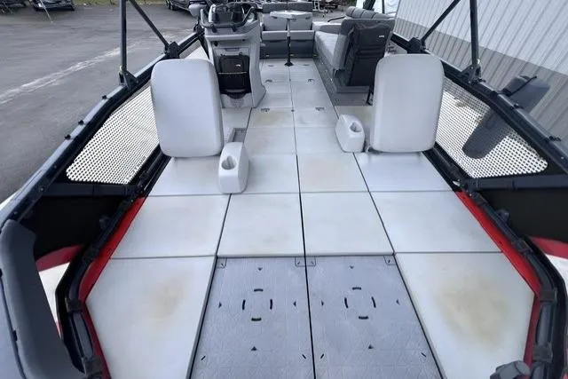 Slide: The Image of 2022 Seadoo Switch interior with modular seating and spacious deck layout. - 8