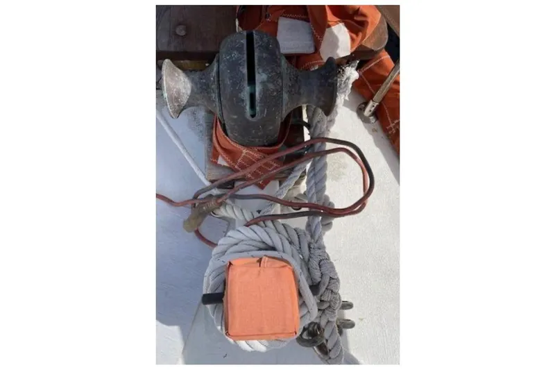 Slide: The Image of Vintage Alden Cutter 1939 deck equipment with ropes and winch. - 20