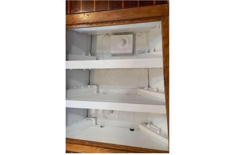 Slide: The Image of Interior view of 1939 Alden Graves Coastwise Cutter 36, showcasing wooden and painted structural elements. - 23