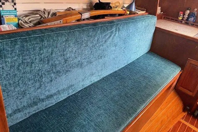 Slide: The Image of Vintage 1939 Alden Graves Cutter interior with teal upholstery and wooden accents. - 5