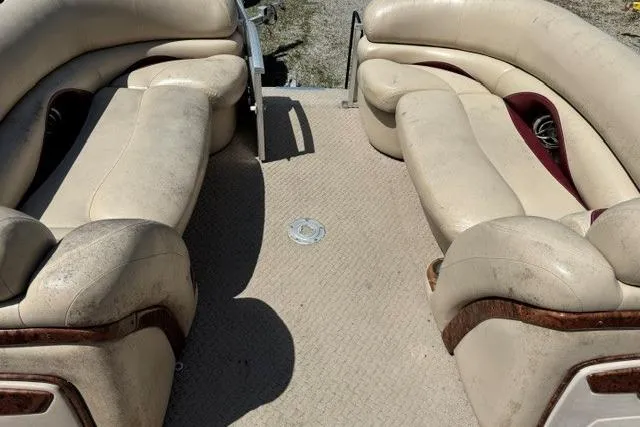 Slide: The Image of 2008 Sun Tracker Party Barge 25 Regency Edition with beige seating and spacious deck. - 10