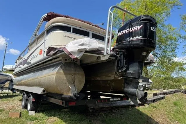 Slide: The Image of 2008 Sun Tracker Party Barge 25 Regency Edition with Mercury 150 engine on trailer. - 13