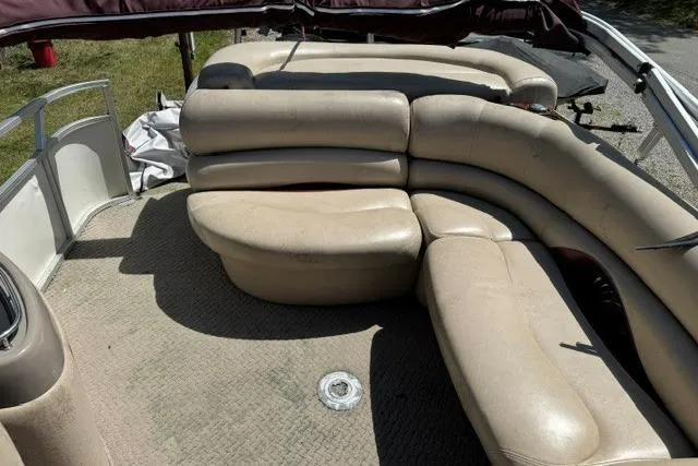 Slide: The Image of 2008 Sun Tracker Party Barge 25 Regency Edition with beige seating and carpeted deck. - 7